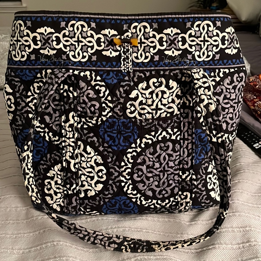 Vera Bradley tote, good condition with a slight tear on one handle